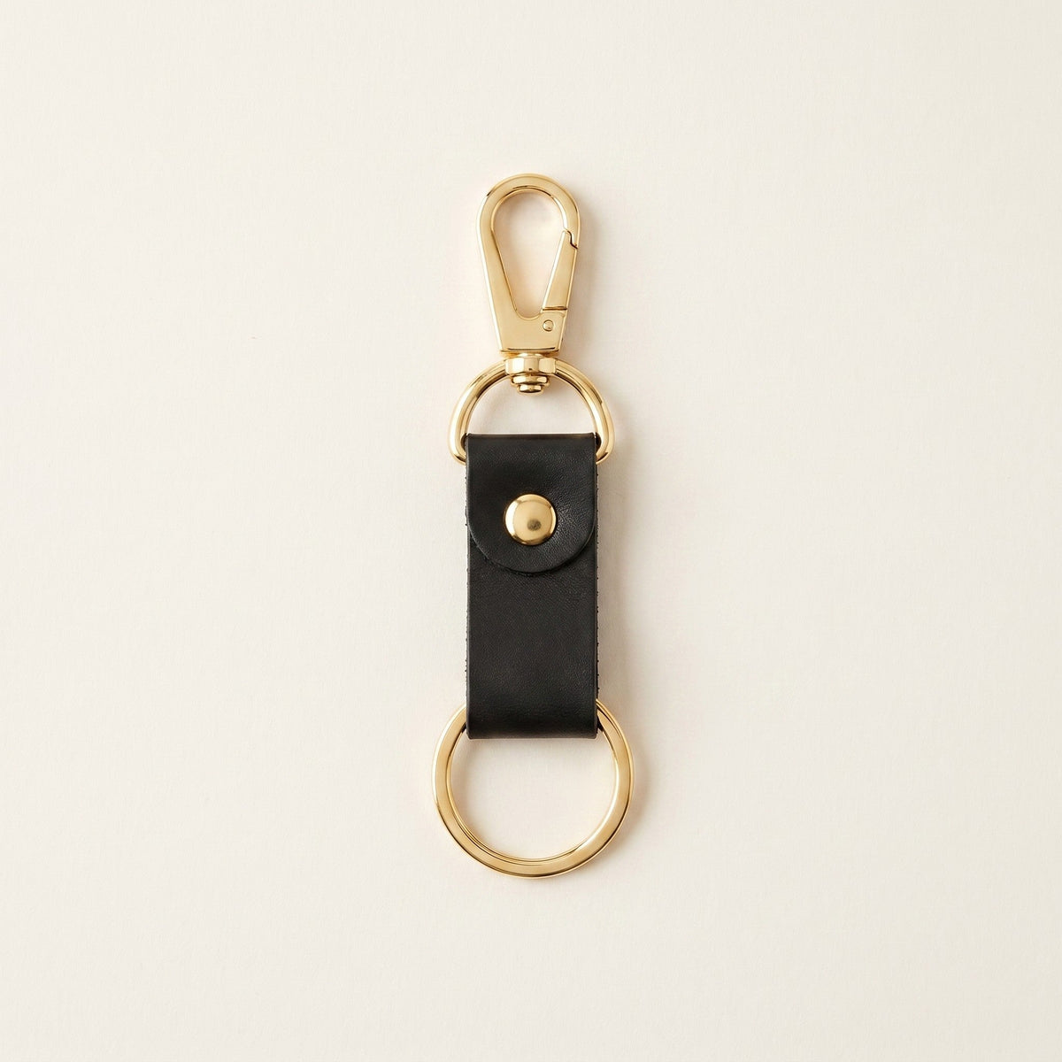Gold carry clip with black leather