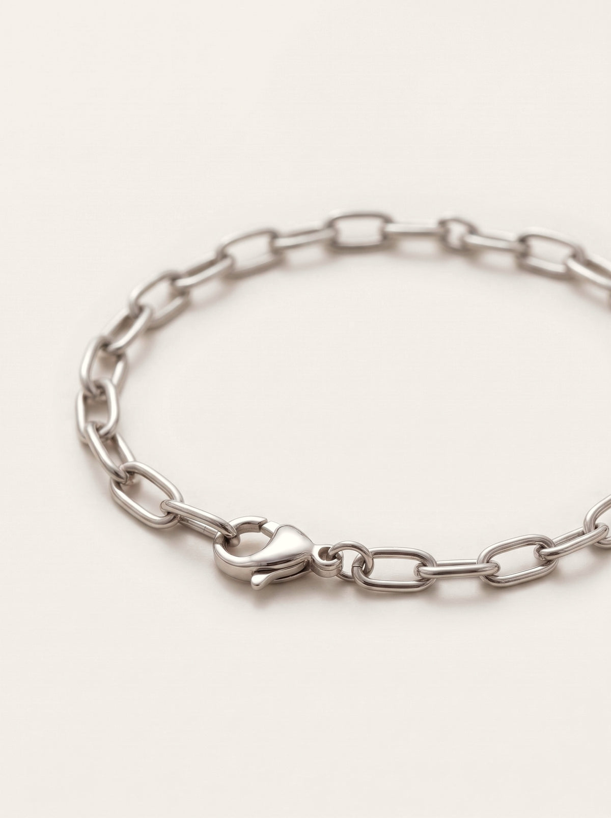 Silver bracelet closeup with lobster clasp