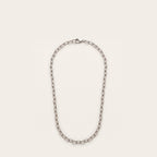 Silver elongated cable chain necklace on bone